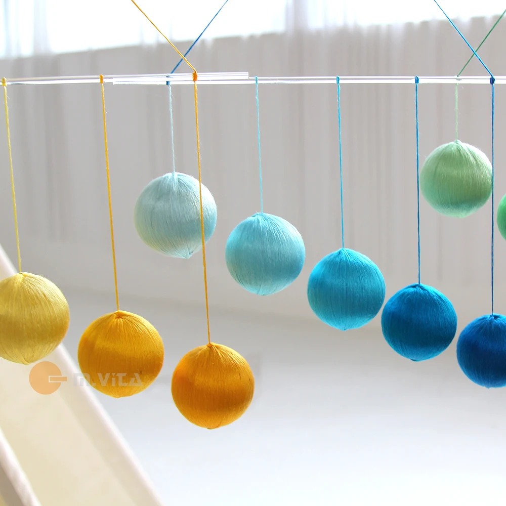 Набор из четырех собранных детских мобильных телефонов монтессори - Фотография_2