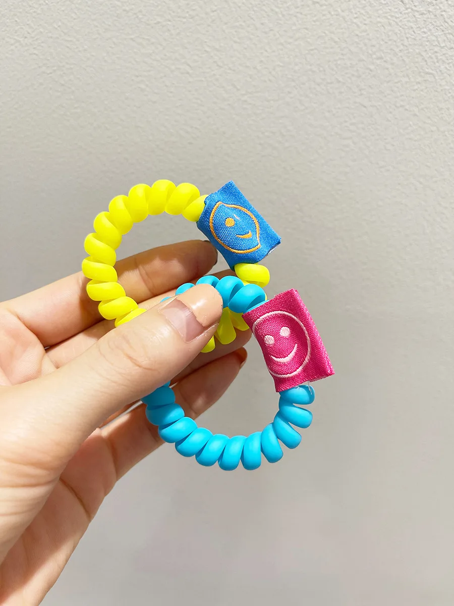 Женская резинка для волос с улыбающимся лицом - Фотография_5