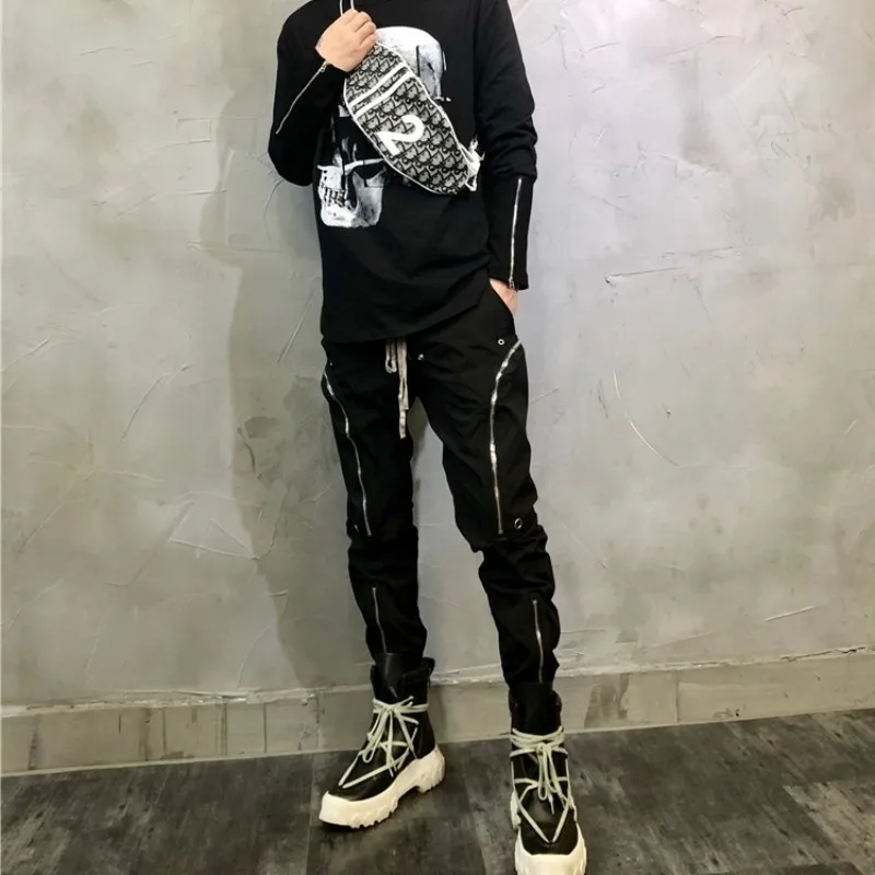 Модные черные брюки-карго на молнии с карманами - Фотография_4