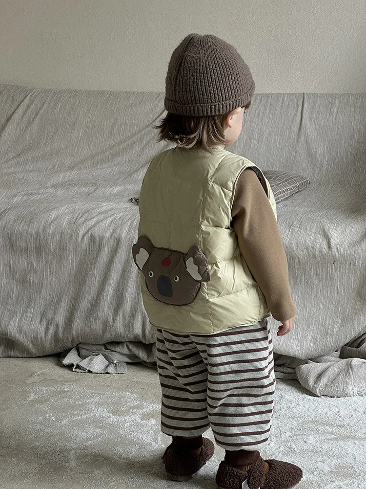 Детский пуховый жилет с героями мультфильмов - Фотография_5