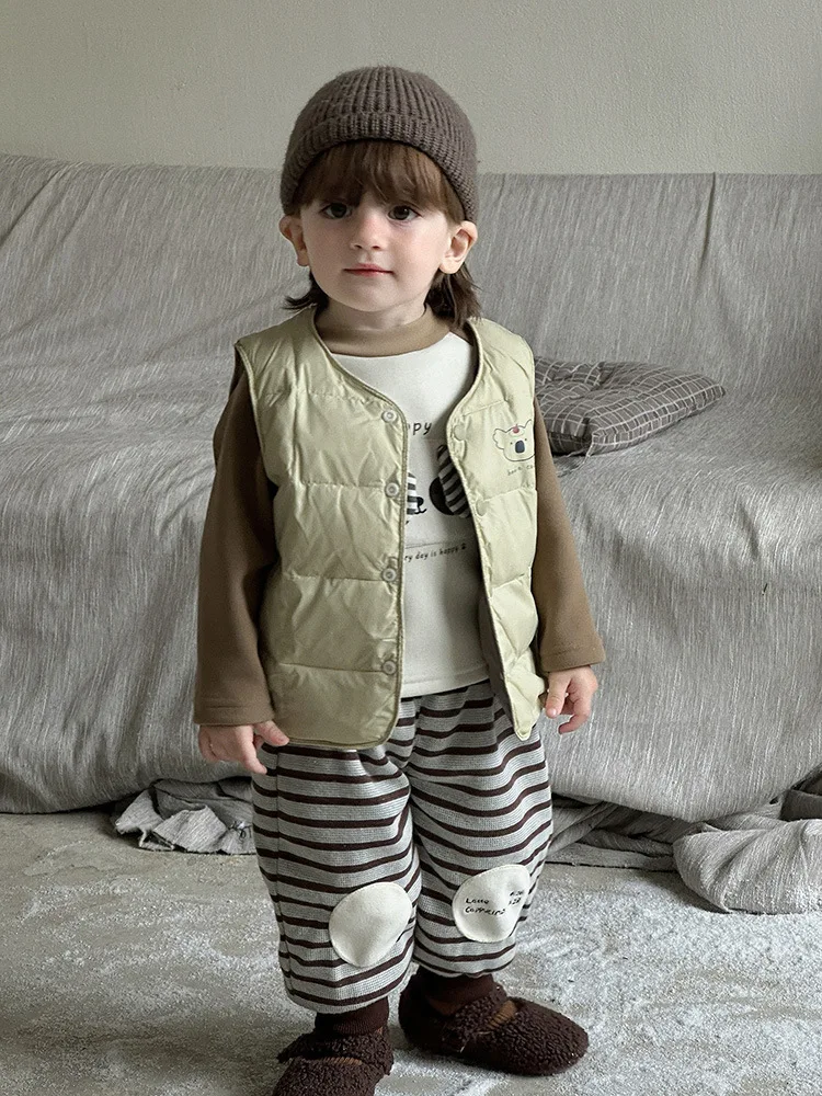 Детский пуховый жилет с героями мультфильмов - Фотография_4