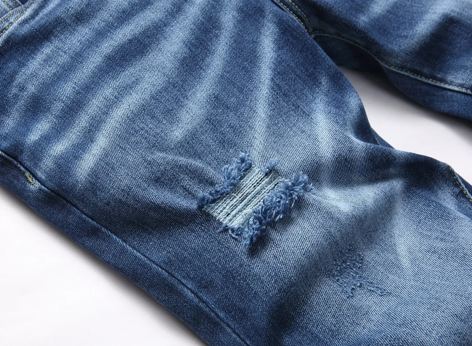 Мужские рваные джинсы - Фотография_6