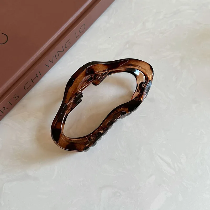 Женские нерегулярные полые заколки для волос с когтями - Фотография_4