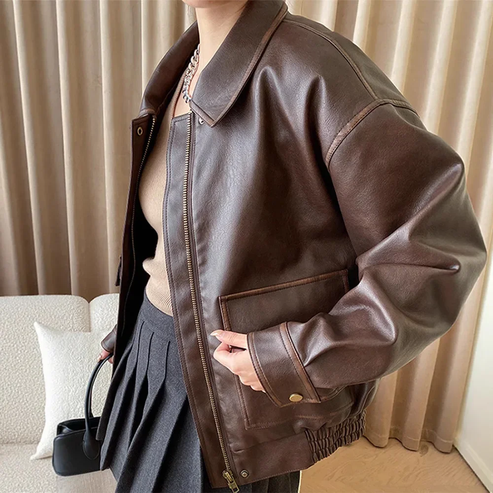 Коричневая кожаная куртка - Фотография_5