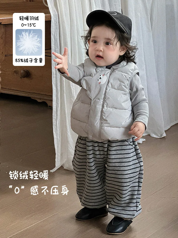 Стильный пуховый жилет для мальчиков и девочек - Фотография_2