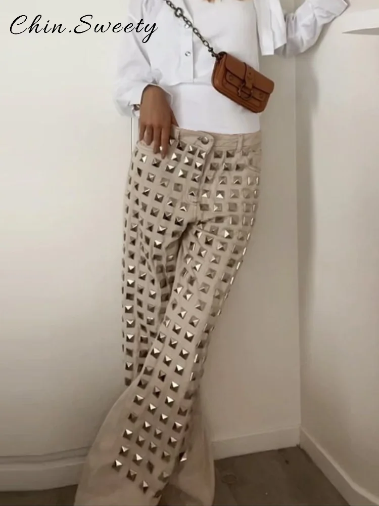 Винтажные джинсовые брюки с заклепками