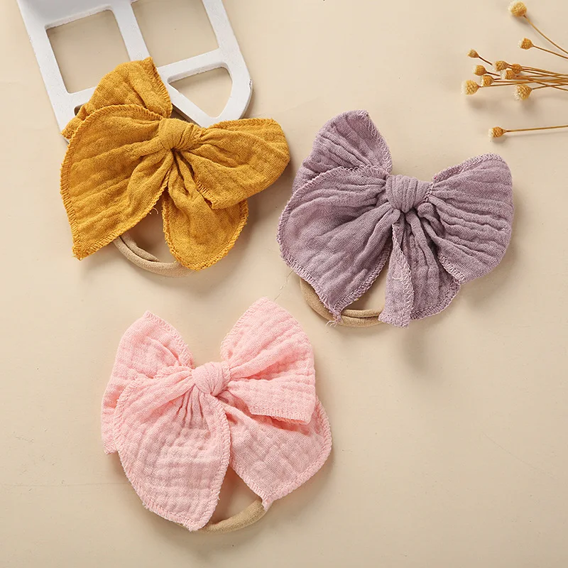 Хлопковая повязка на голову с бантом для новорожденных - Фотография_2