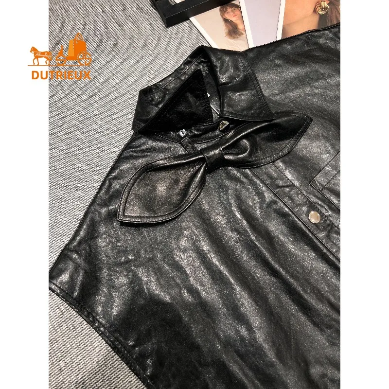 Осенний женский жилет из натуральной кожи со съемным бантом на воротнике - Фотография_6