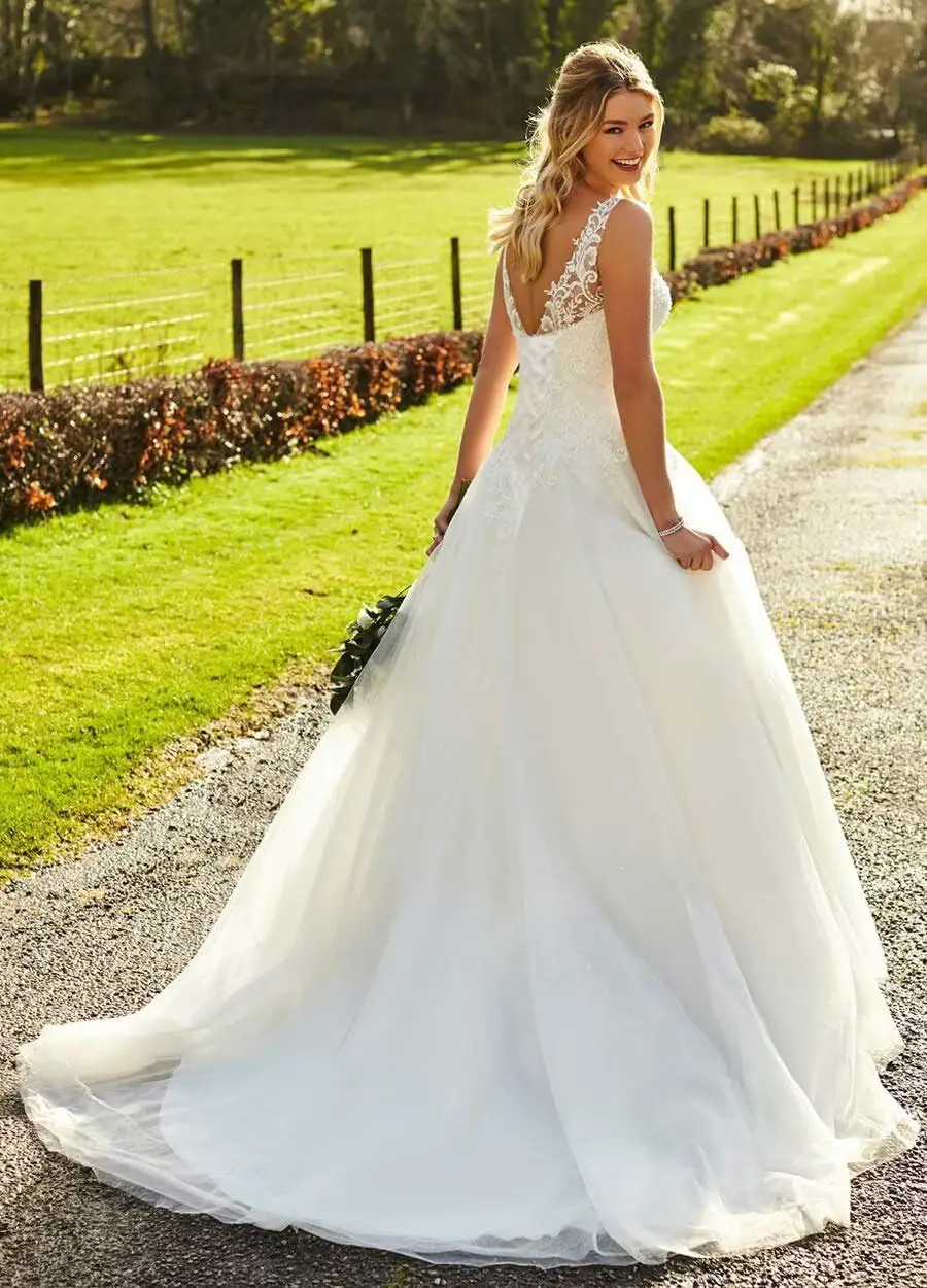 Роскошные свадебные платья для невесты без рукавов с v-образным вырезом - Фотография_2