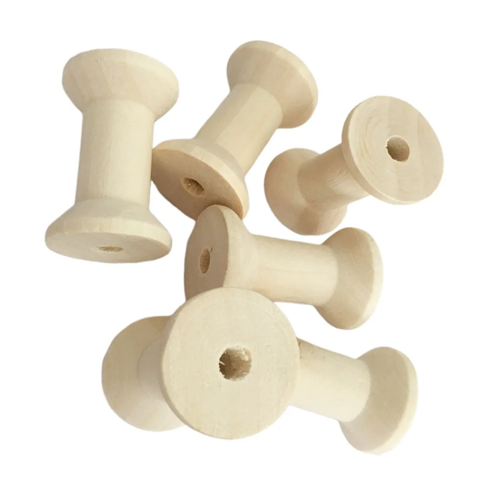 Деревянные катушки с нитками в форме песочных часов - Фотография_3