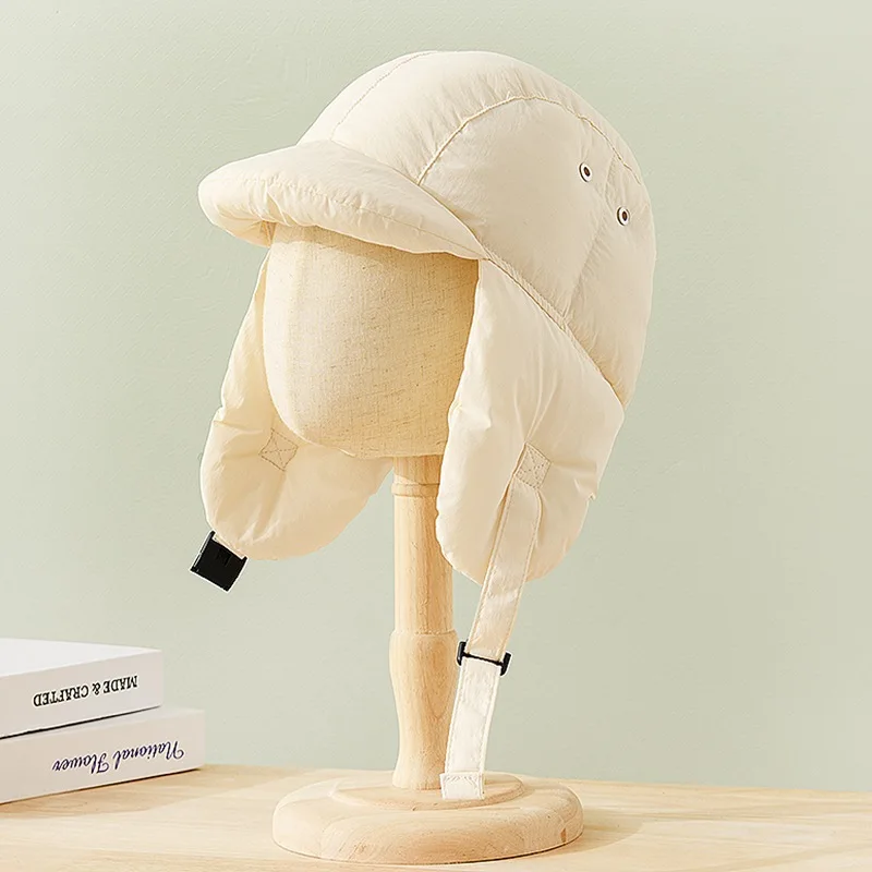 Модные зимние теплые шапки-бомберы - Фотография_6