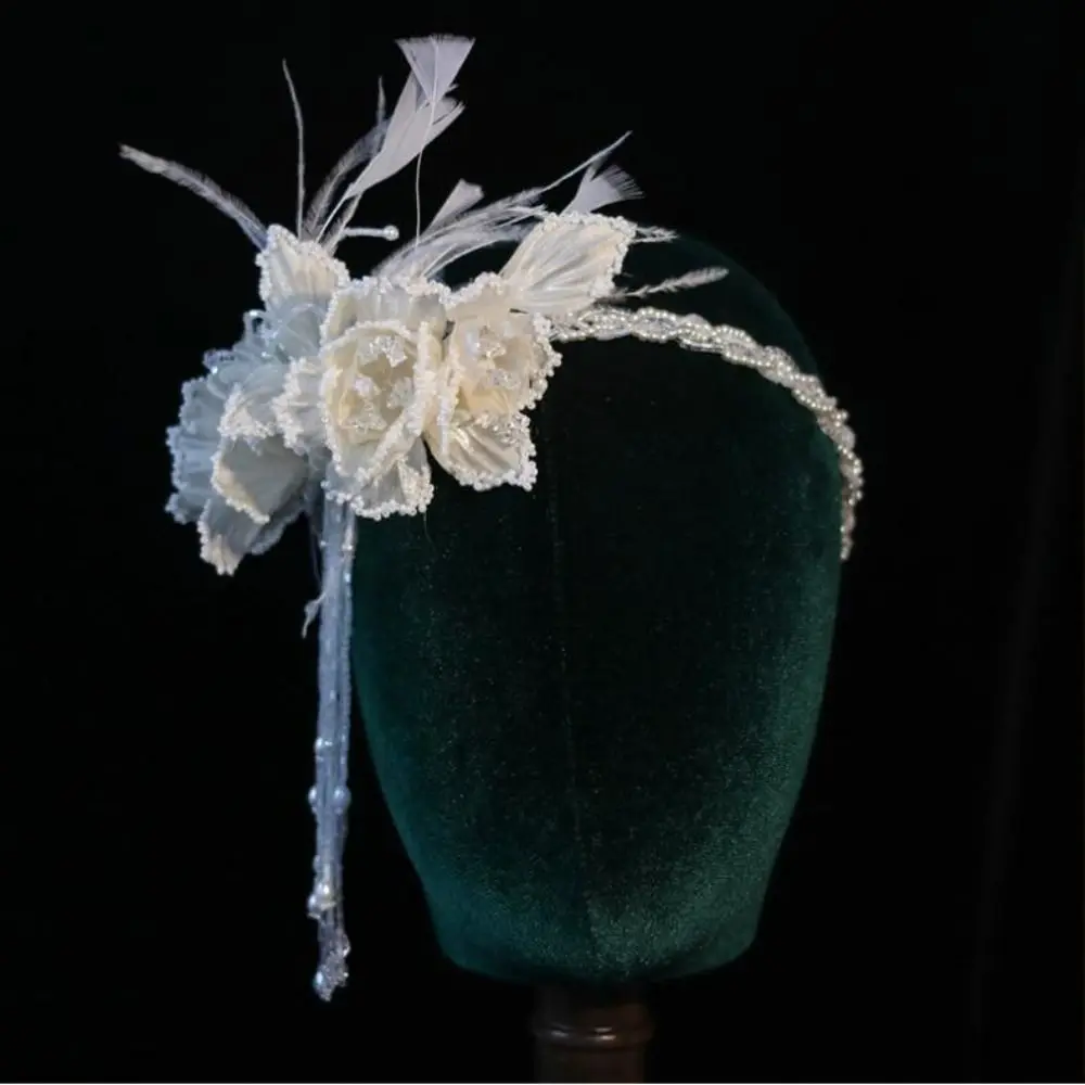 Изысканные свадебные повязки на голову с перьями и жемчугом - Фотография_3