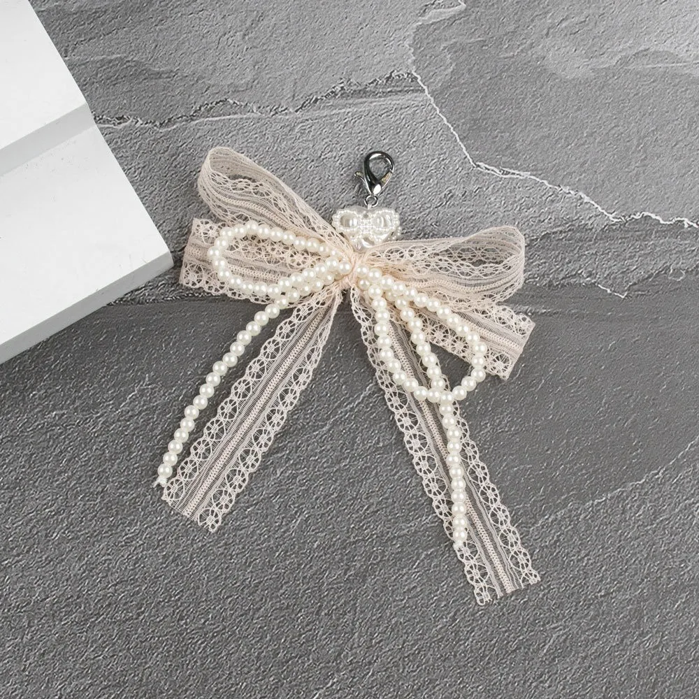 Милый кружевной брелок с бантом - Фотография_5