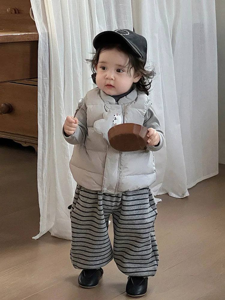 Стильный пуховый жилет для мальчиков и девочек - Фотография_5