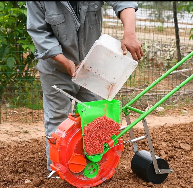 Machine hand push corn seeder seed - Фотография_2