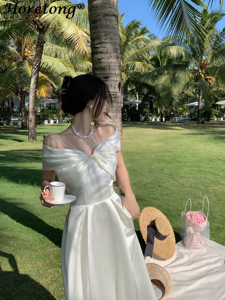 Женское платье-миди с бантом и вырезом-лодочкой - Фотография_6