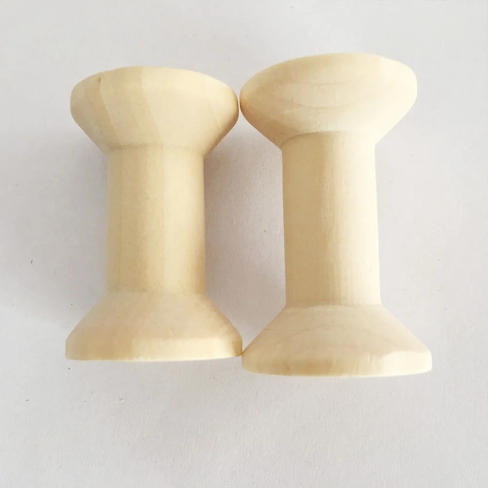 Деревянные катушки с нитками в форме песочных часов - Фотография_6