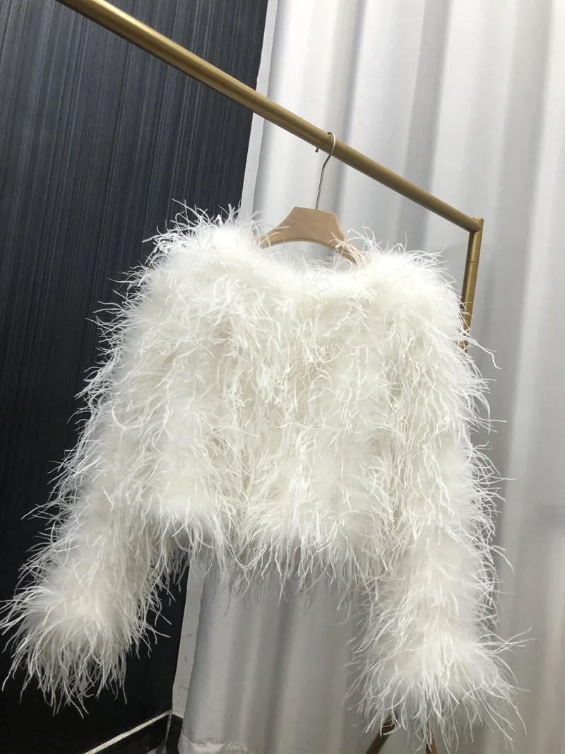 Женская зимняя куртка из натуральных страусиных перьев - Фотография_5