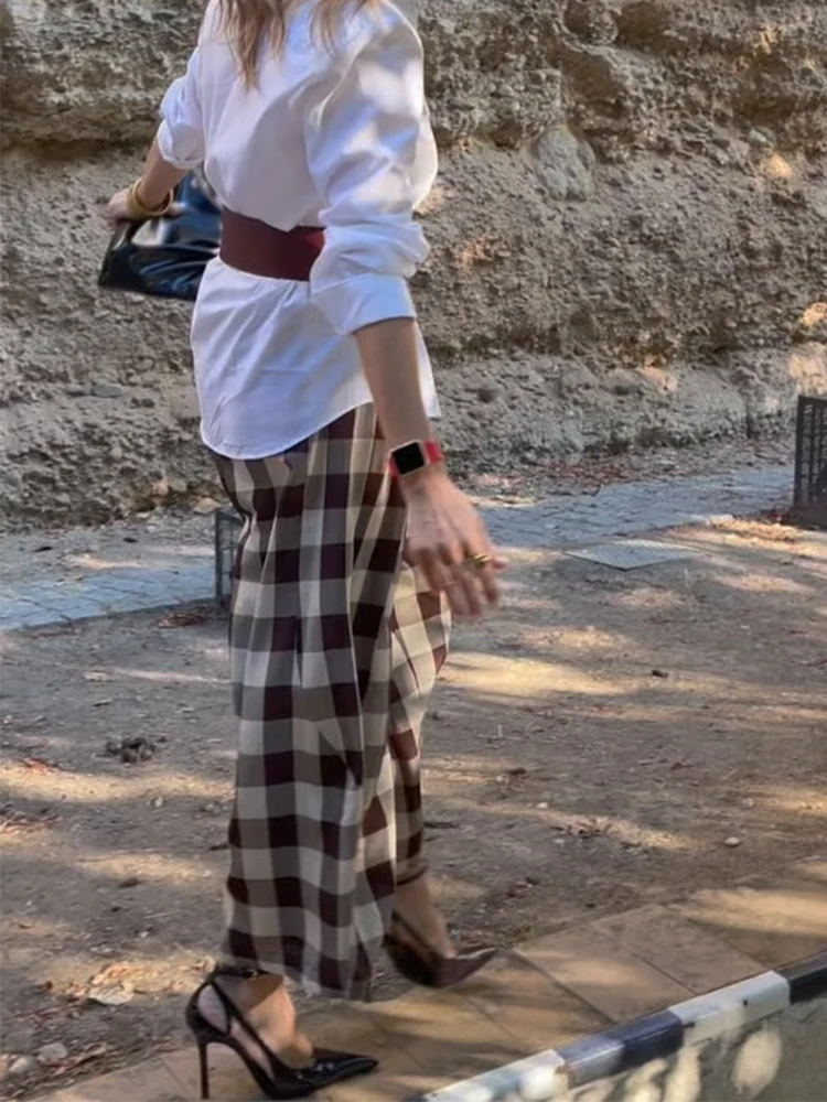 Шикарные свободные укороченные брюки в клетку - Фотография_3