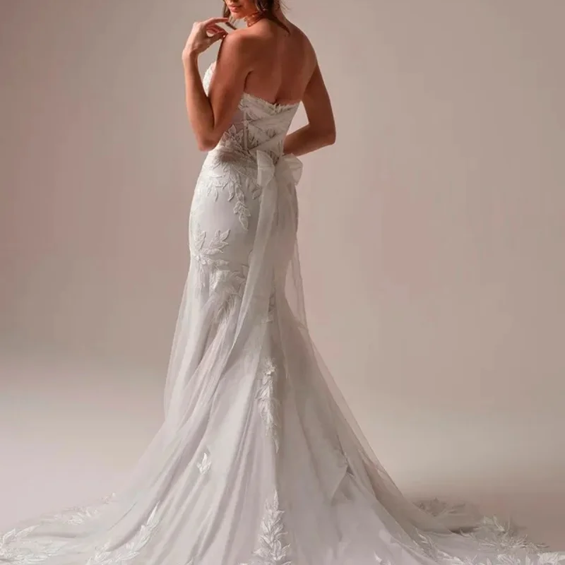 Свадебные платья цвета слоновой кости с открытыми плечами - Фотография_3