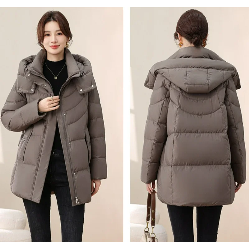 Женские пуховики средней длины с капюшоном - Фотография_3