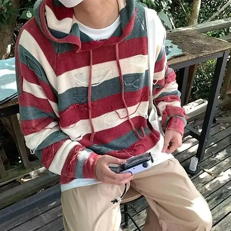 Модные вязаные пуловеры с капюшоном и дырками