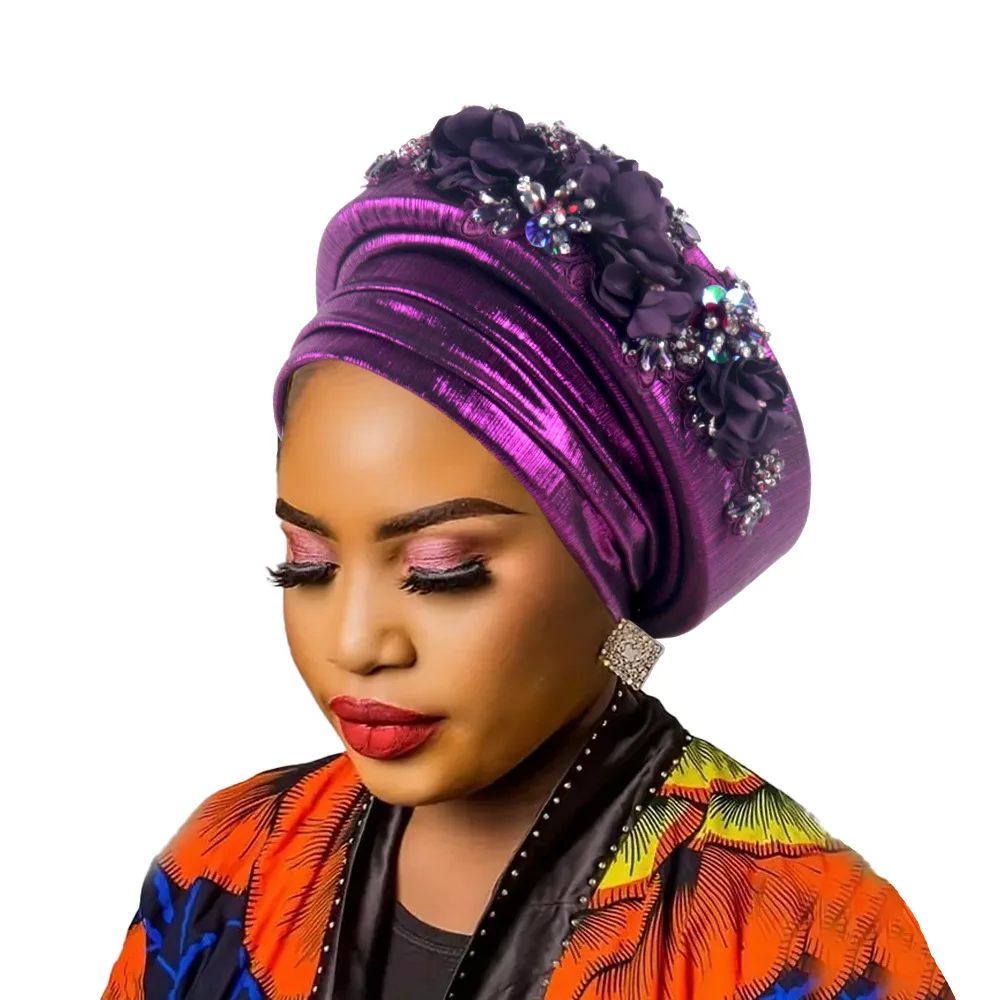 Африканский женский тюрбан с бриллиантовым цветком - Фотография_5