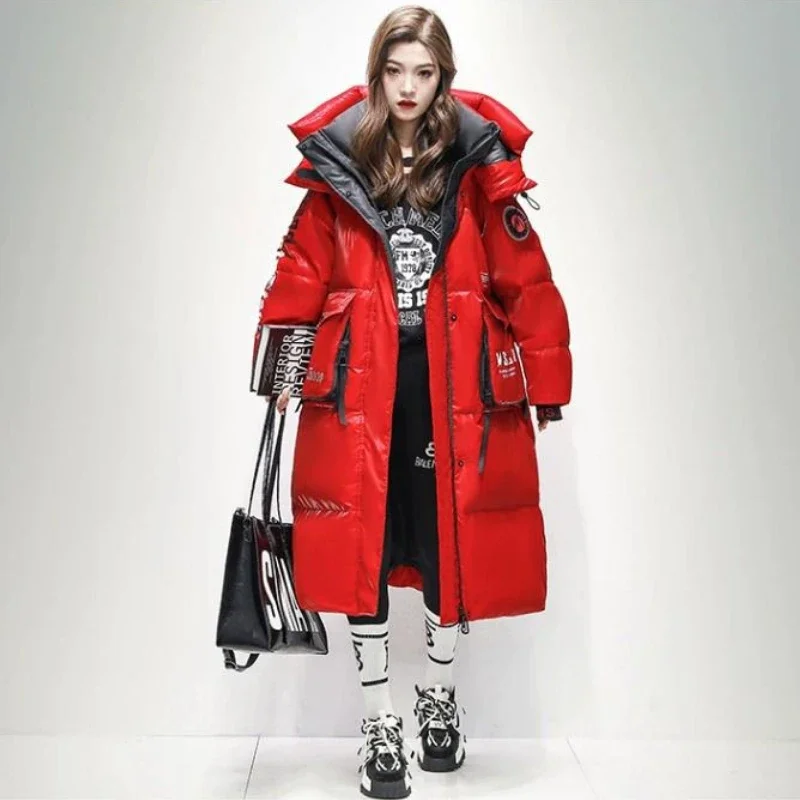 Пуховик женский длинный ветрозащитный с большими карманами и капюшоном - Фотография_6