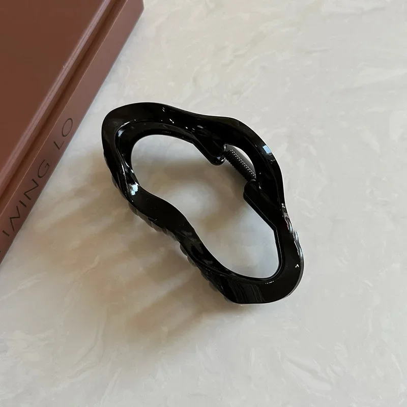 Женские нерегулярные полые заколки для волос с когтями - Фотография_6