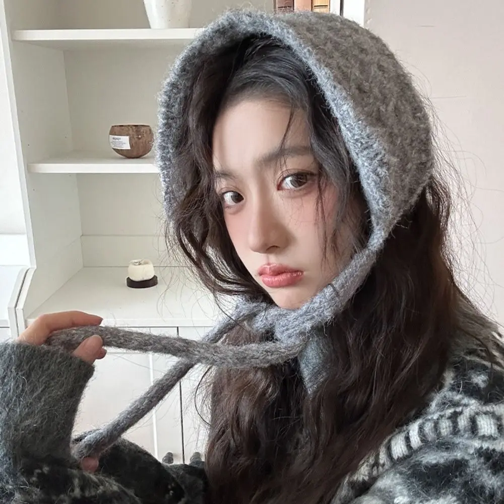 Утолщенные шерстяные наушники с ремешками - Фотография_4