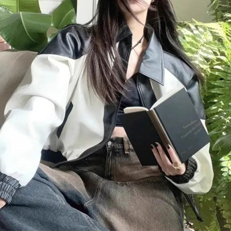 Американская винтажная черно-белая кожаная мотоциклетная куртка для женщин - Фотография_3