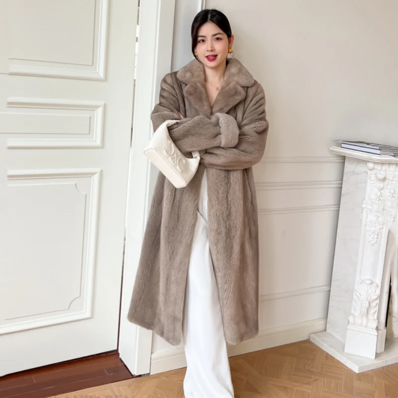 Новая модная женская шуба из натурального норкового меха с поясом - Фотография_6