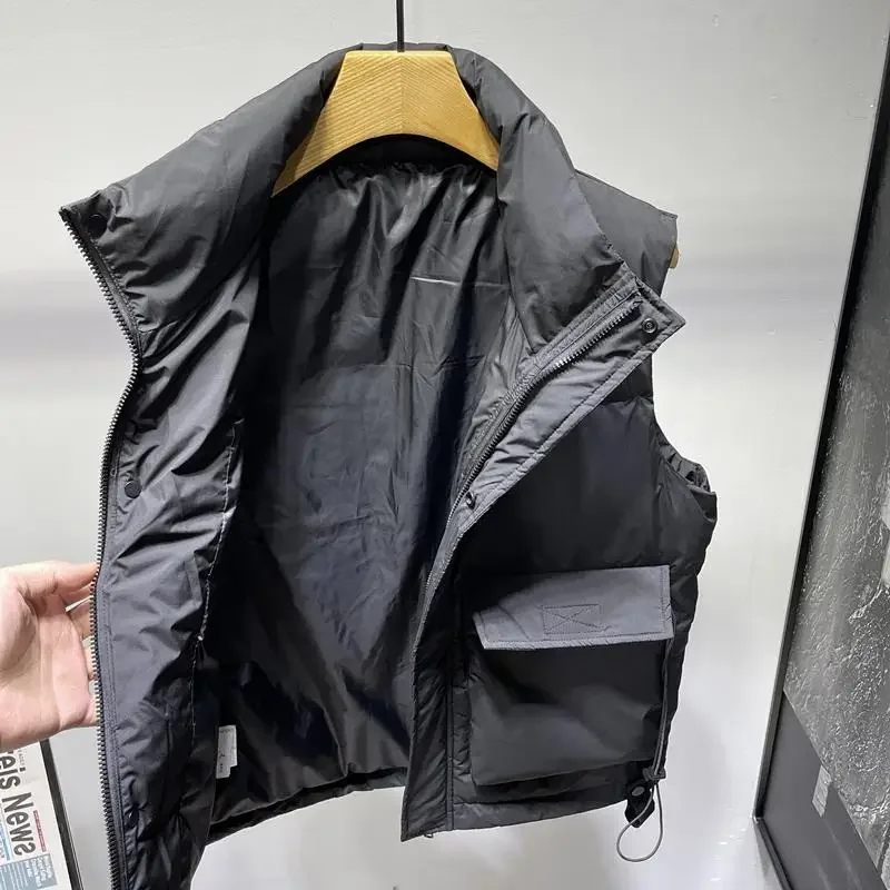 Новые пуховые жилеты - Фотография_3