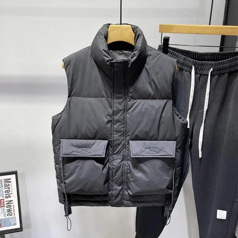 Новые пуховые жилеты