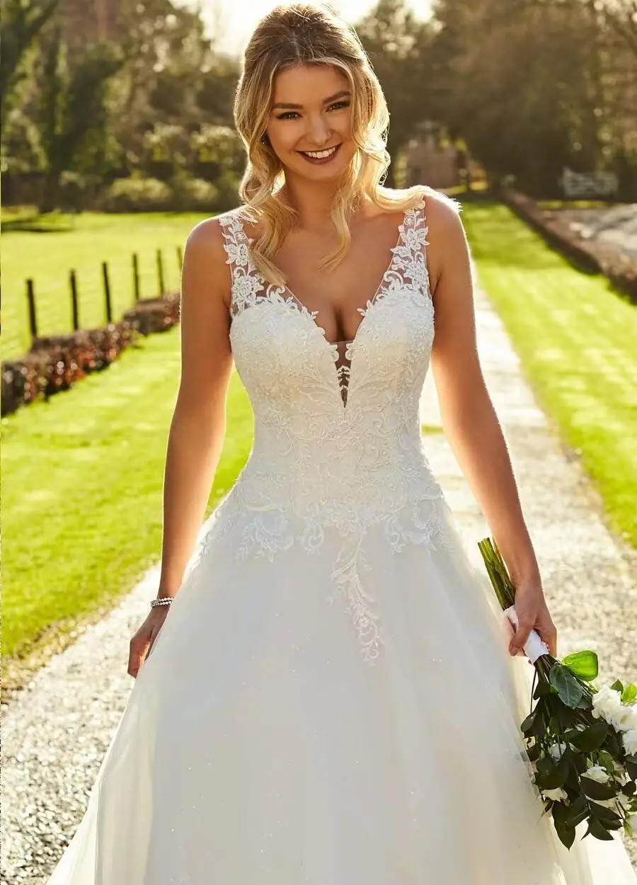 Роскошные свадебные платья для невесты без рукавов с v-образным вырезом - Фотография_3