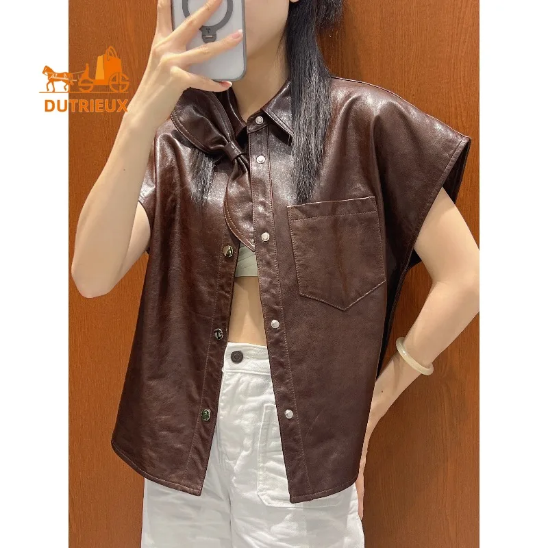 Осенний женский жилет из натуральной кожи со съемным бантом на воротнике - Фотография_3