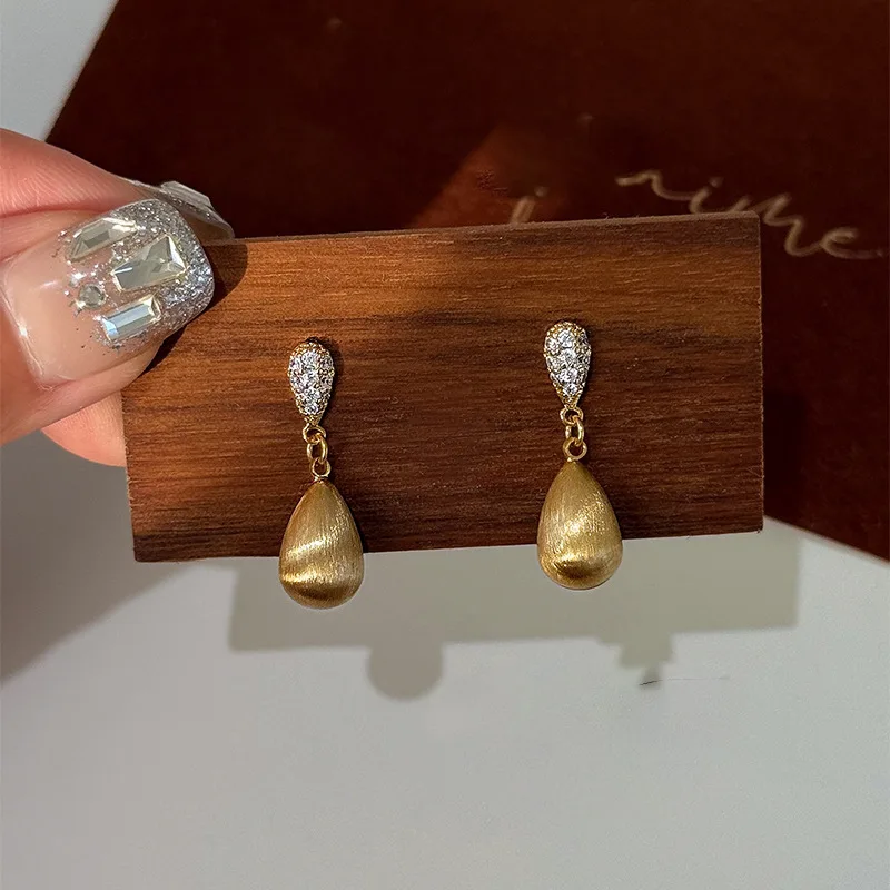 Серьги-капли с цирконом из стерлингового серебра - Фотография_4