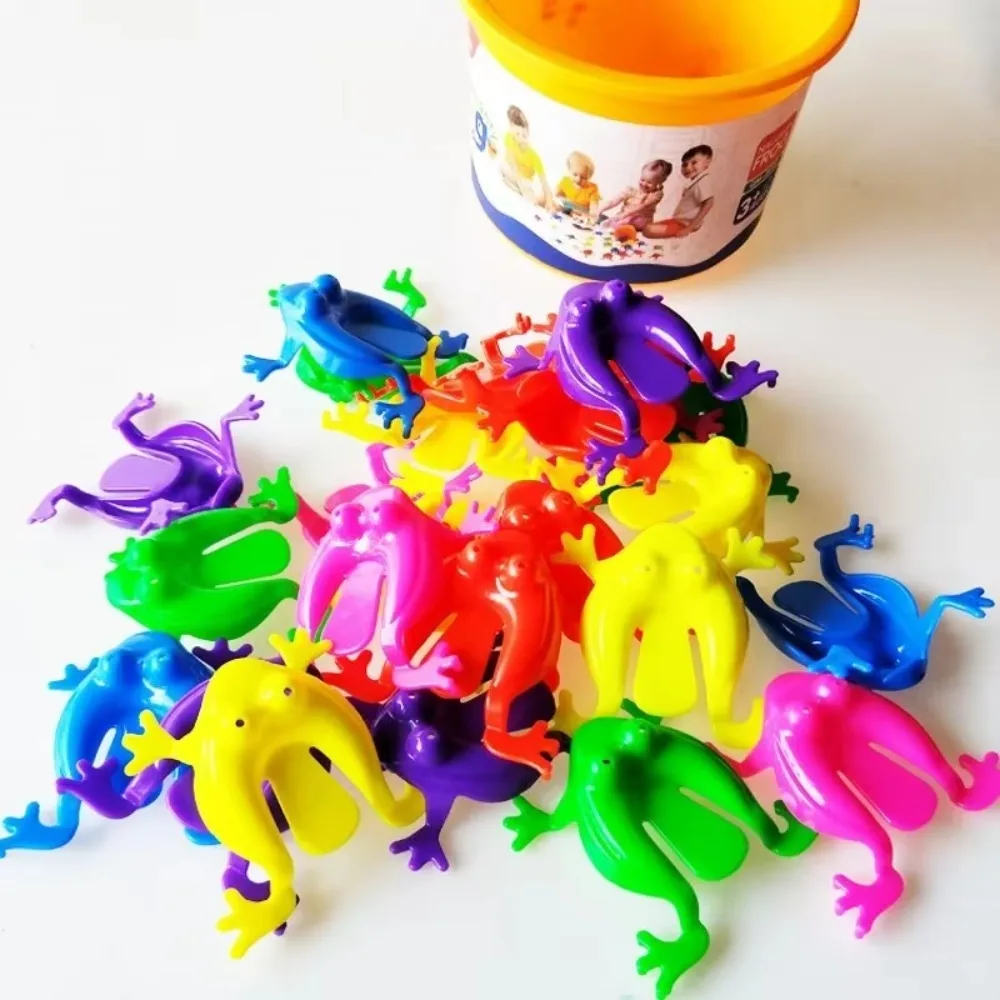 Игрушки-лягушки ярких цветов