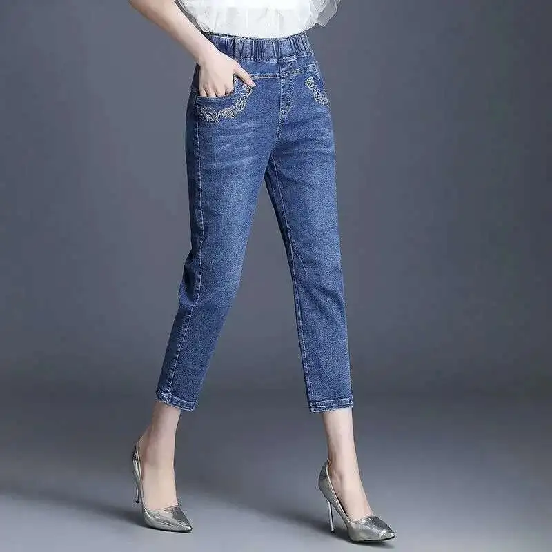 Винтажные женские джинсовые брюки с вышивкой - Фотография_3