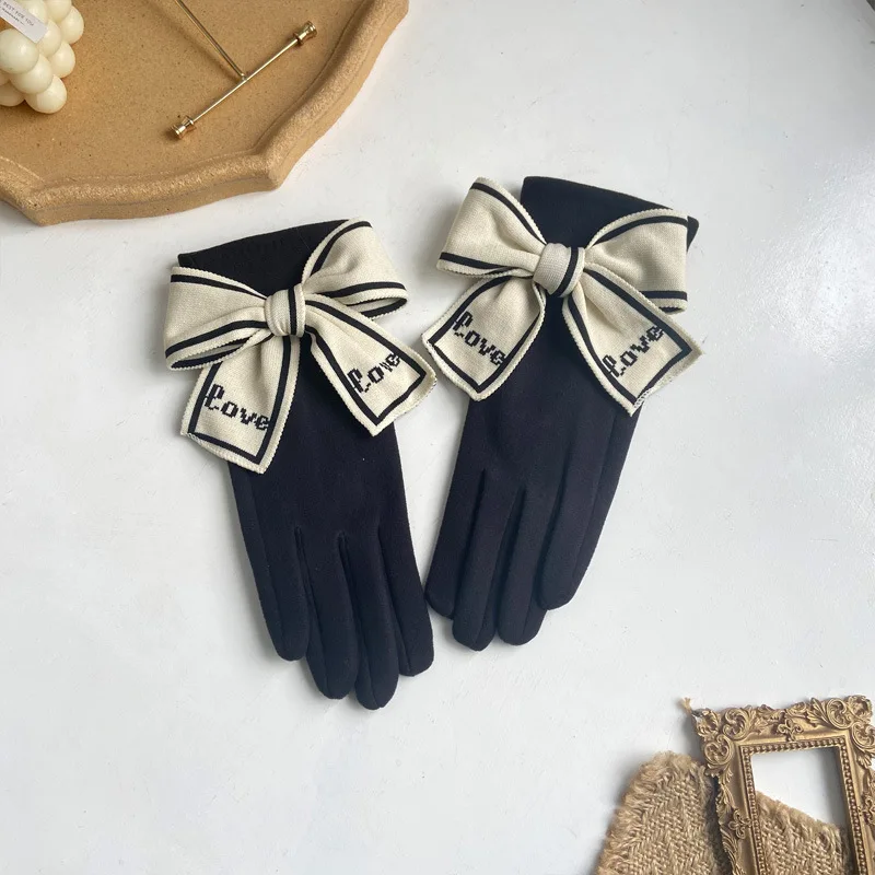 Женские вязаные перчатки с бантом - Фотография_6