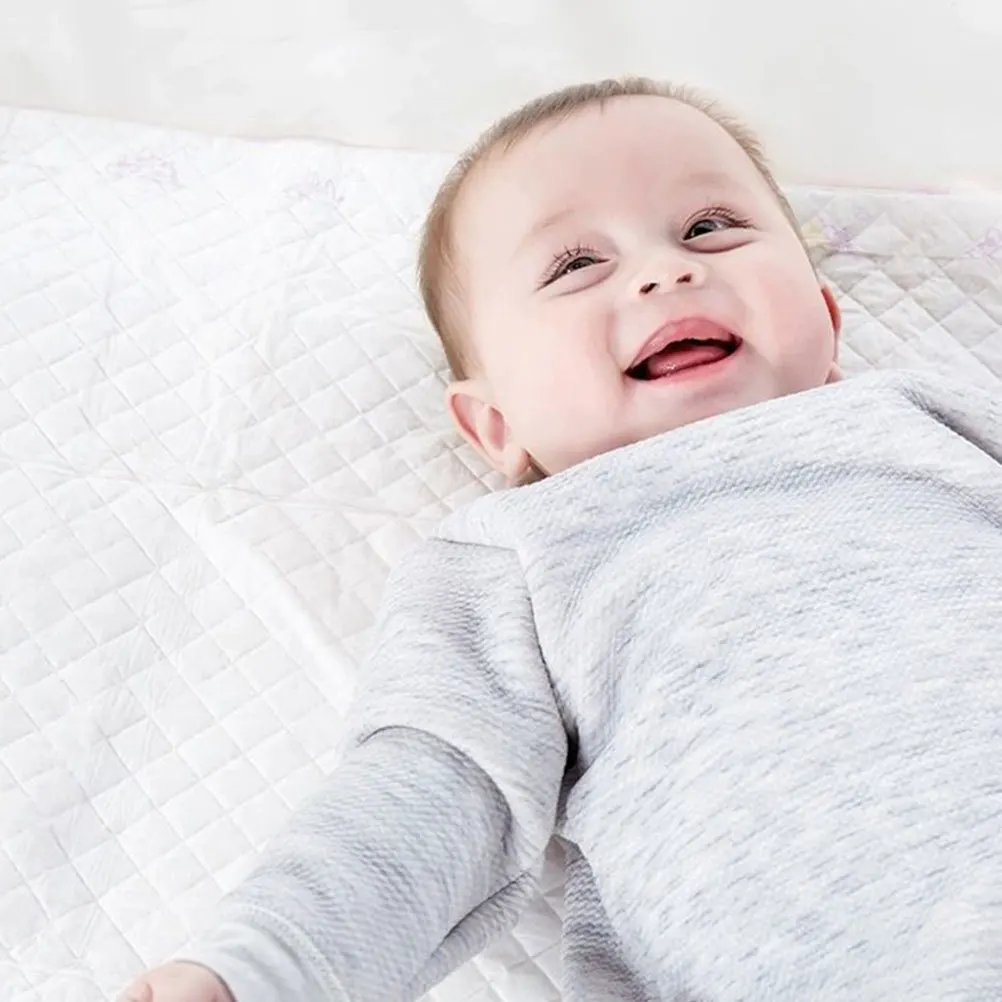 Одноразовые пеленальные подушечки - Фотография_6