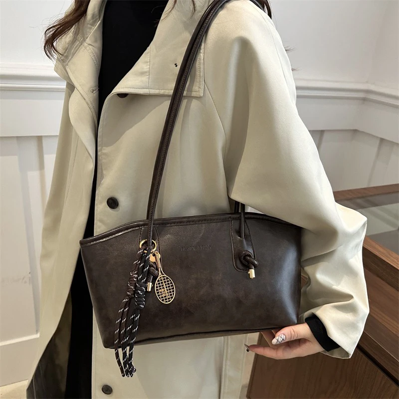 Женская дорожная сумка через плечо с узлом - Фотография_2