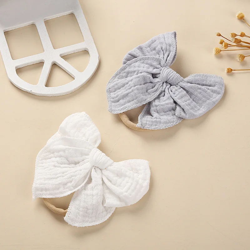 Хлопковая повязка на голову с бантом для новорожденных - Фотография_5