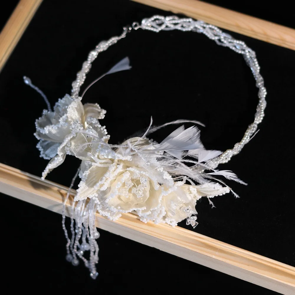 Изысканные свадебные повязки на голову с перьями и жемчугом