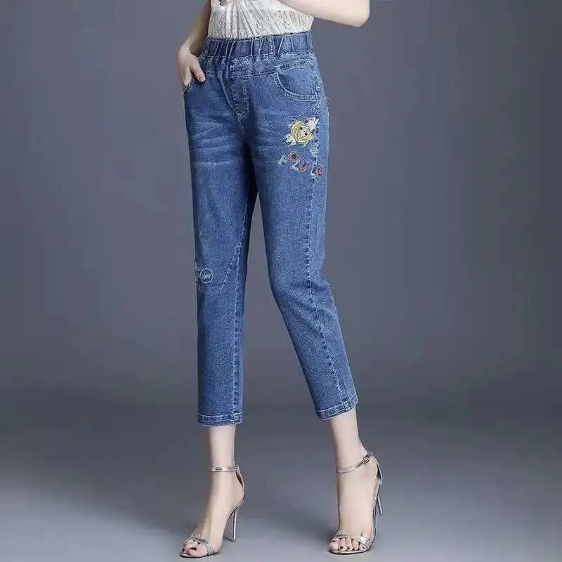 Винтажные женские джинсовые брюки с вышивкой - Фотография_4