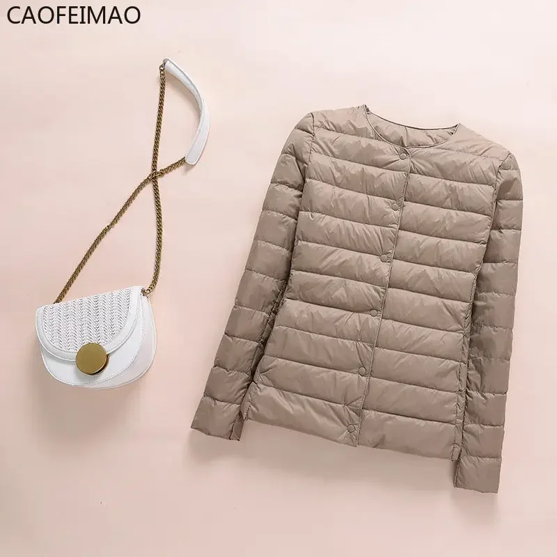 Женская куртка на утином пуху с подкладкой и круглым вырезом - Фотография_5