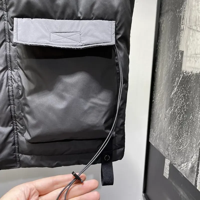 Новые пуховые жилеты - Фотография_6