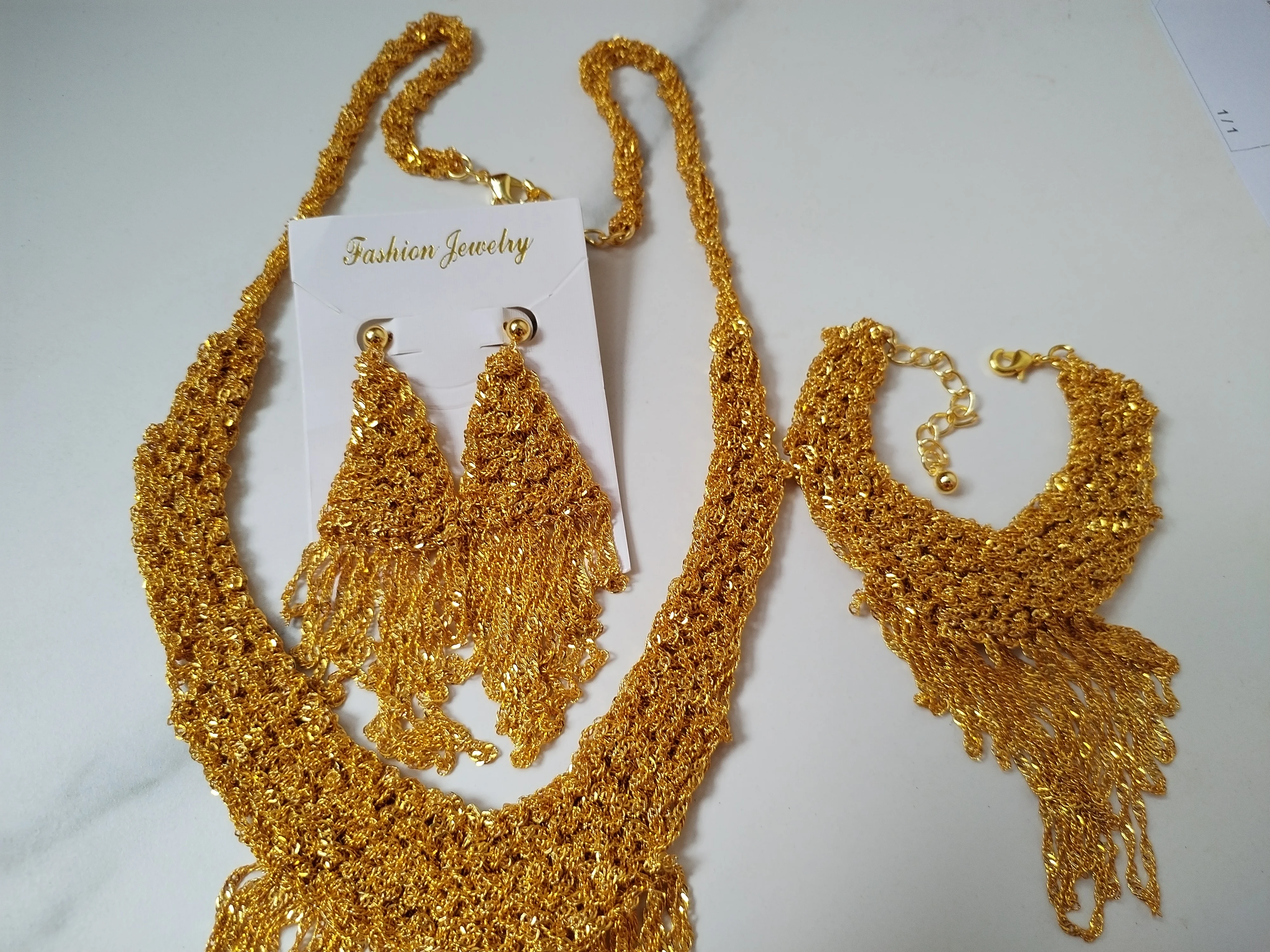 Ожерелье, браслет и серьги с покрытием 24-каратным золотом - Фотография_6