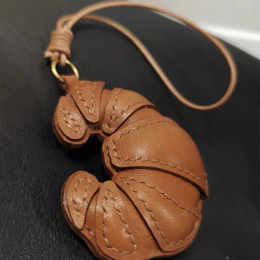 Сумка из искусственной кожи с коровьим рогом - Фотография_6