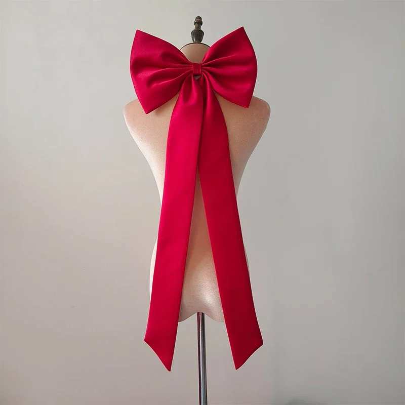 Свадебный аксессуар с бантом для платья невесты - Фотография_4